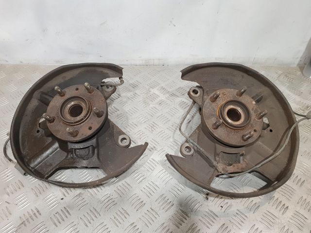 Кулак поворотный передний левый L20633030A MAZDA