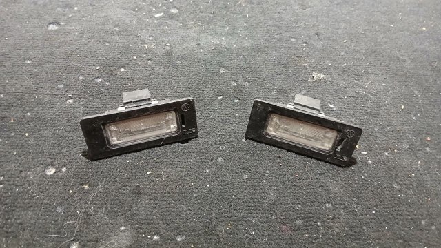 Фонарь освещения номера 8T0943021 VAG