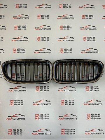 7336477 BMW Решетка радиатора левая купить в Хмельницкий