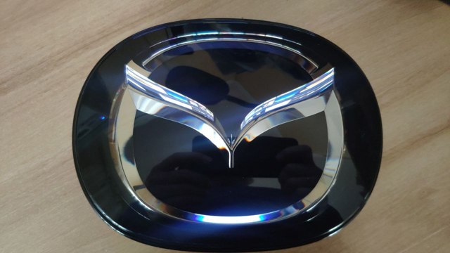 MAZDA TK7951730 Эмблема капота в наличии Днепр