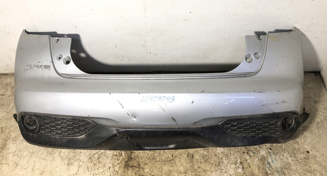 Юбка заднего бампера 850B23YM0A NISSAN