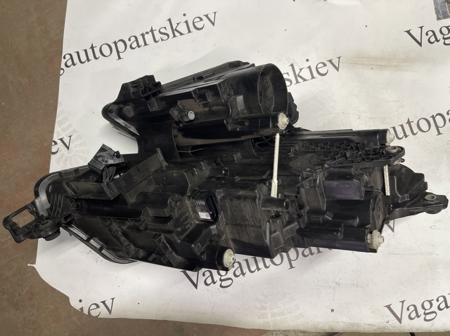 VAG 566941015F Фара левая в наличии Украина
