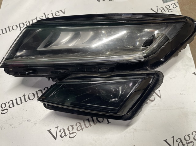VAG 566941015F Фара левая в наличии Каменское