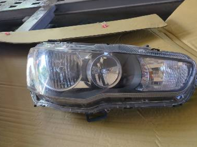 Фара комбинированная, передняя 8301B930 MITSUBISHI