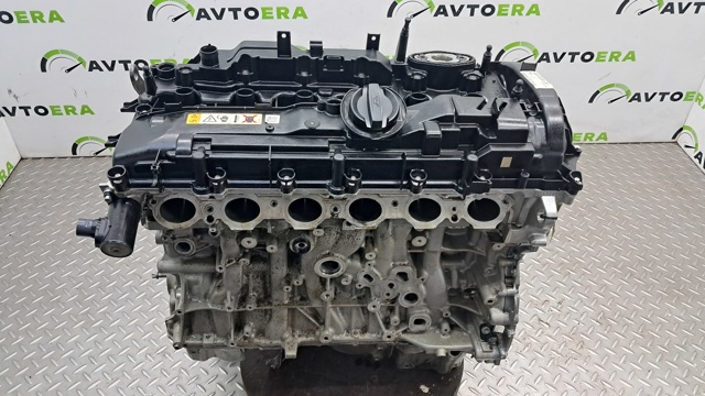 Двигатель голый 11002457989 BMW
