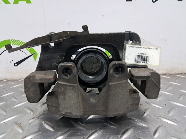 Суппорт тормозной левый задний 34216791017 BMW