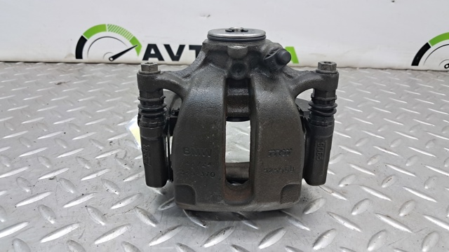 34216891767 BMW Суппорт тормозной задний левый купить в Ровно