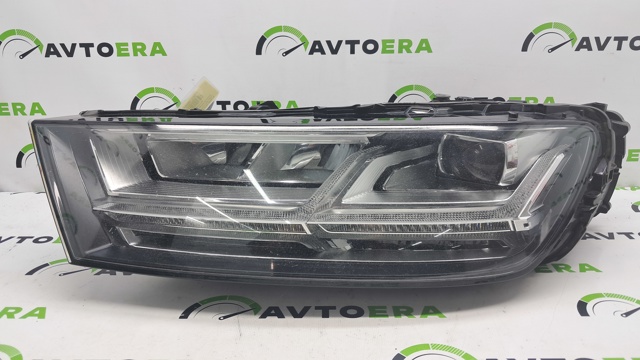 Вставка фары левой 4M0941773B VAG