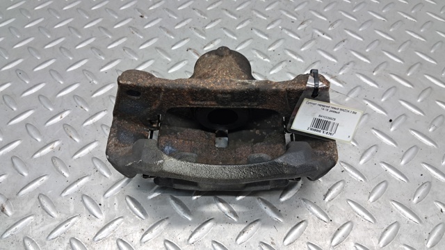 Суппорт тормозной передний левый B4Y03399ZB MAZDA