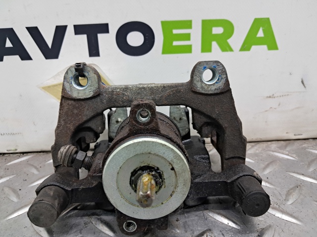 Суппорт тормозной левый задний DG9Z2553C FORD