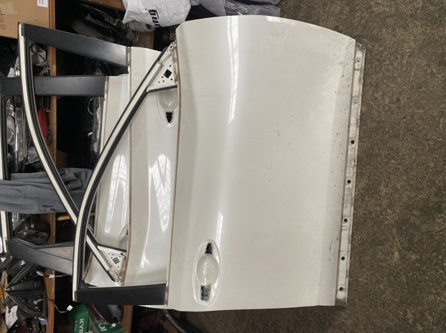 Пассажирская передняя дверь H010M4CBAA NISSAN