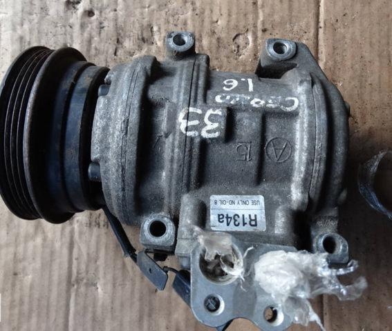 Компрессор кондиционера 1204022700 HYUNDAI