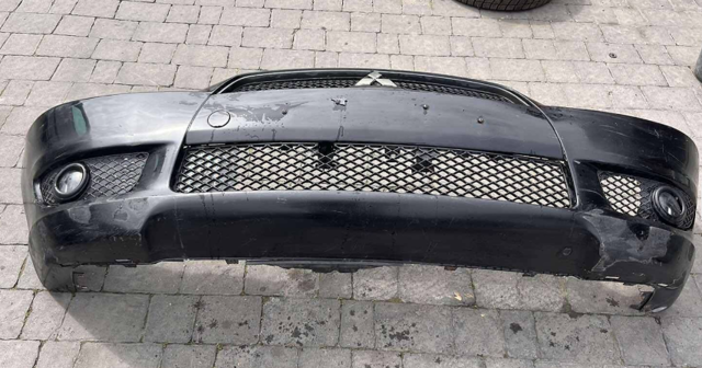 Передний бампер 6400B913HC MITSUBISHI