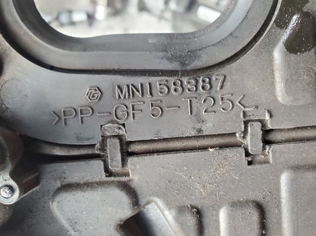 Нижний кожух ремня ГРМ MN158387 MITSUBISHI