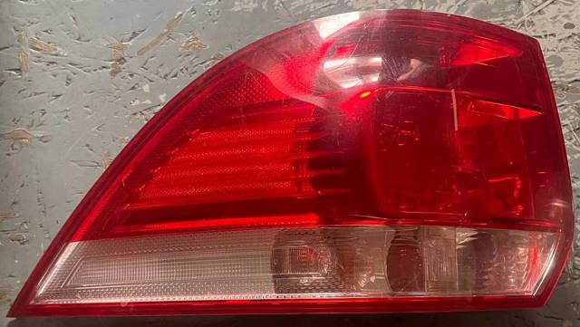 Фонарь задний левый 1K9945095 VAG