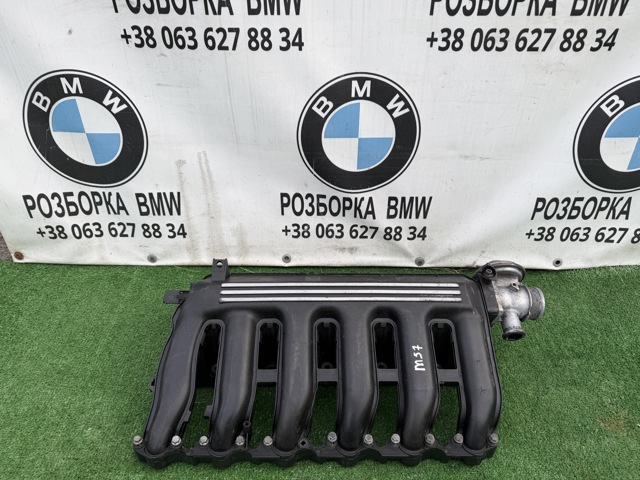 Коллектор впускной 7792019 BMW