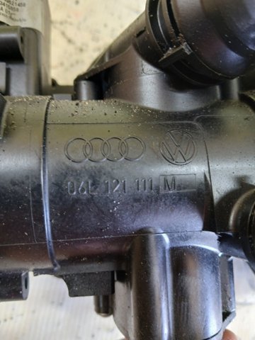 Термостат в сборе 06L121111M VAG