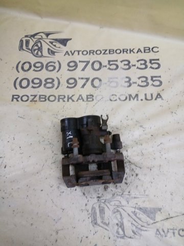 Тормозной суппорт задний левый 34206883033 BMW
