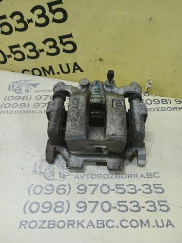 Суппорт тормозной левый задний 440111AA0A NISSAN