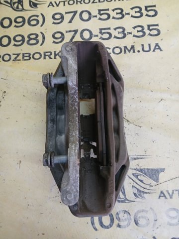 Суппорт тормозной, передний, левый 4M0615105 VAG