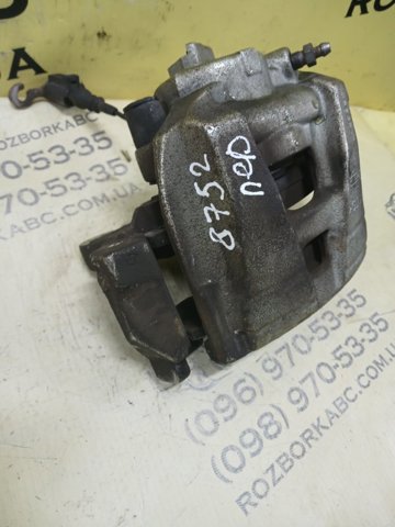 Суппорт тормозной, передний, левый 561615123A VAG
