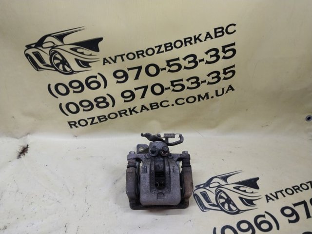 Задний левый суппорт 58210G2300 HYUNDAI