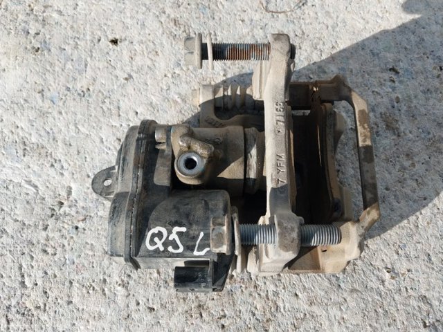 Задний левый суппорт 80A615403A VAG