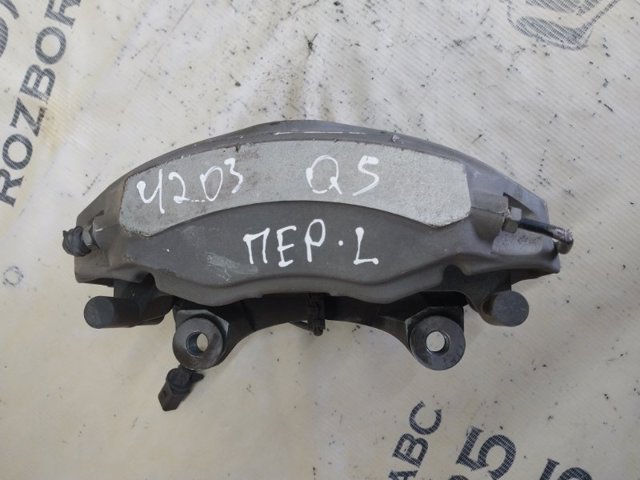 Суппорт тормозной передний левый 8W0615107C VAG