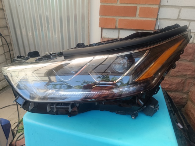 Вставка фары левой 811500E521 TOYOTA