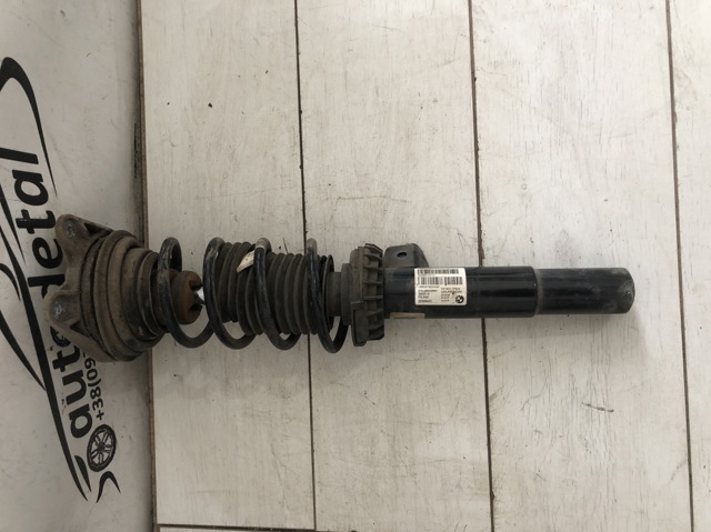 Стойка передняя левая 31316880097 BMW