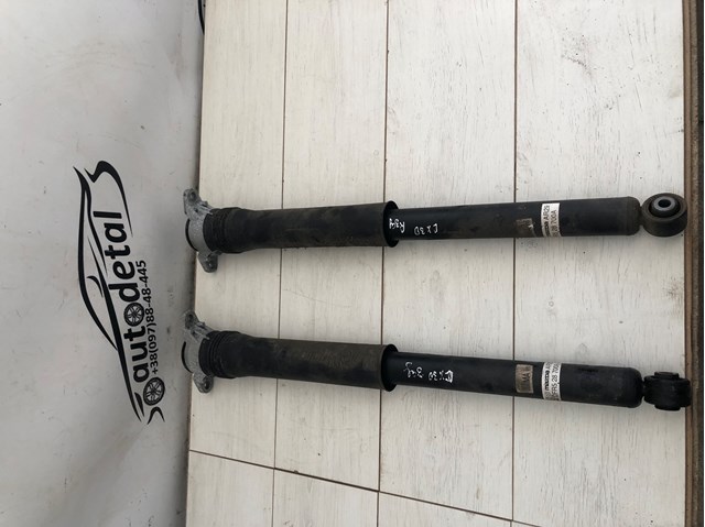 Стойка амортизатора задняя DFR528700 MAZDA