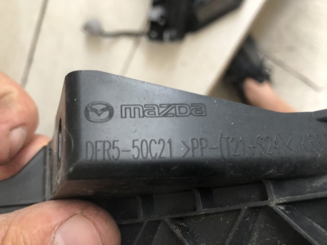 DFR550C21 MAZDA Кронштейн бампера переднего левый купить в Полтава