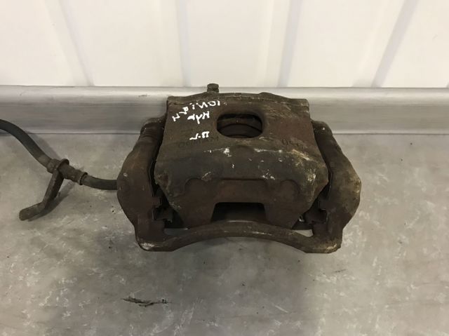 Суппорт тормозной, передний, правый 58130G2100 HYUNDAI