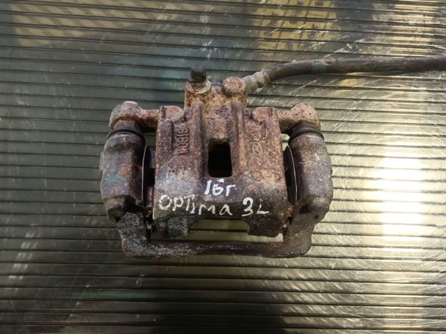 Суппорт тормозной левый задний 58210C1150 HYUNDAI
