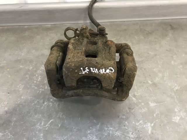 Тормозной суппорт правый задний 58230A4100 HYUNDAI