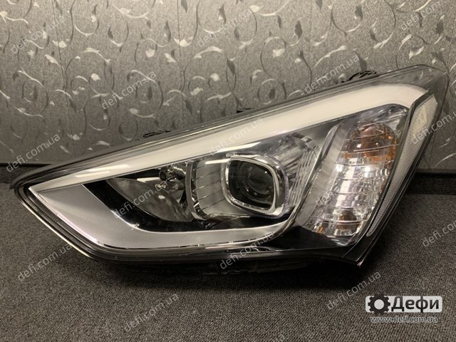 Вставка фары левой 921012W120 HYUNDAI