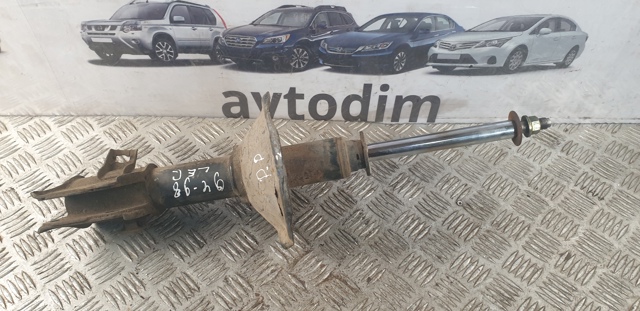 Передний правый амортизатор 20310AC161 SUBARU