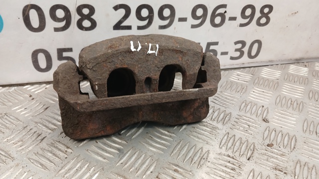 Суппорт тормозной передний правый 26291AC021 SUBARU