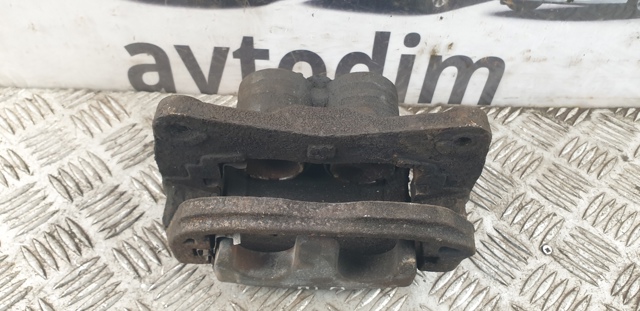Суппорт тормозной, передний, правый 26292SC020 SUBARU