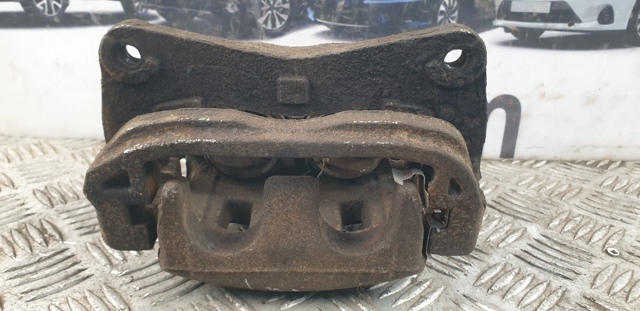 Суппорт тормозной передний левый 26292SC030 SUBARU