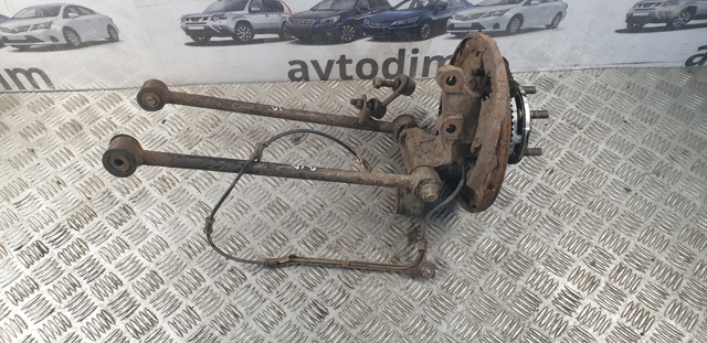 Цапфа - поворотный кулак задний, левый 28012AA055 SUBARU