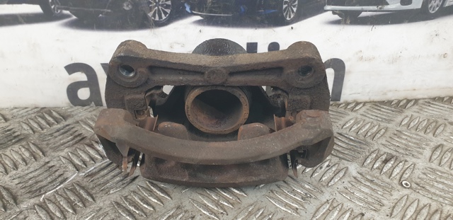 NISSAN 41011ET00A Суппорт тормозной передний левый в наличии Полтава