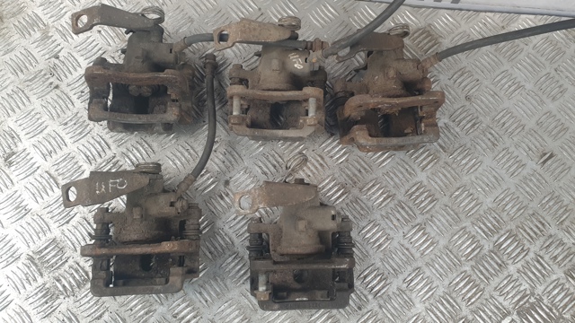 Тормозной суппорт задний левый 43019SMGE02 HONDA