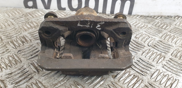 Задний правый суппорт 44001EB30A NISSAN