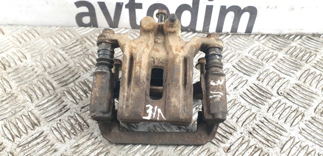 Суппорт тормозной левый задний 44011EB30A NISSAN