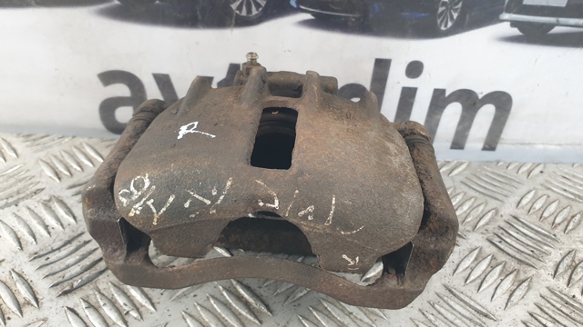 Суппорт тормозной, передний, правый 45012ST3E00 HONDA