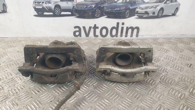 Суппорт тормозной, передний, правый 45018SMGE01 HONDA