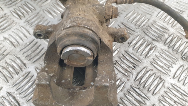 Суппорт тормозной левый задний 4775033061 TOYOTA