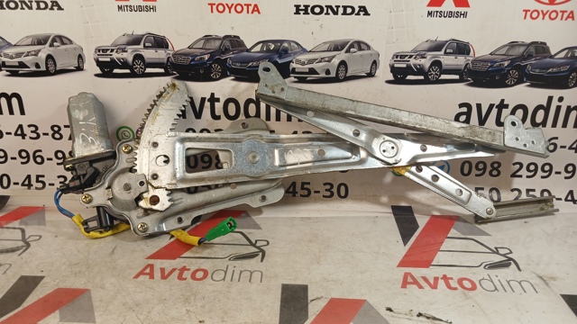 Мотор стеклоподъемника двери задней, левой 62188AE010 SUBARU