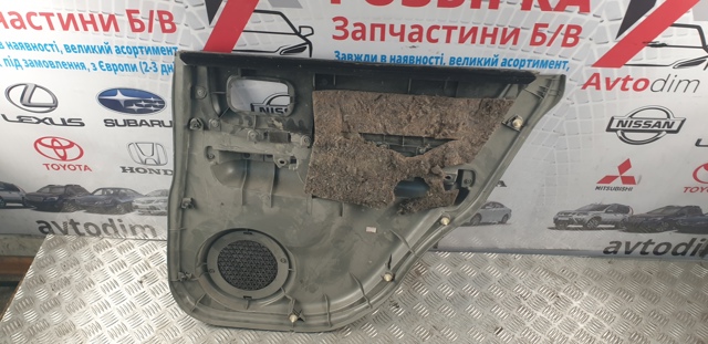82901EQ300 Обшивка (облицовка) внутренняя двери задней левой купить Одесса